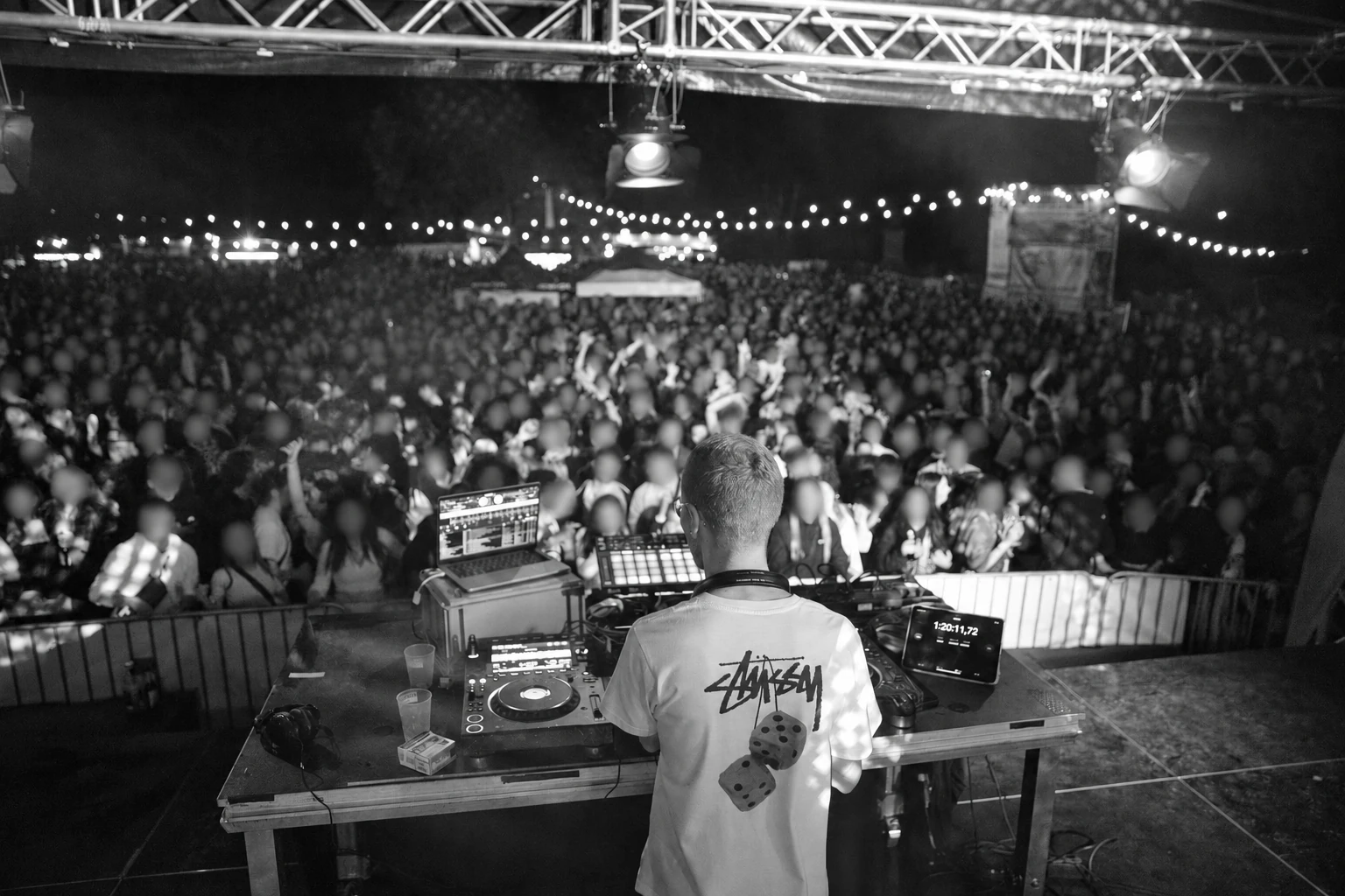 DJ Trenz headlining CAJ Burgfest Siersburg, facing a full festival crowd with faces out of focus